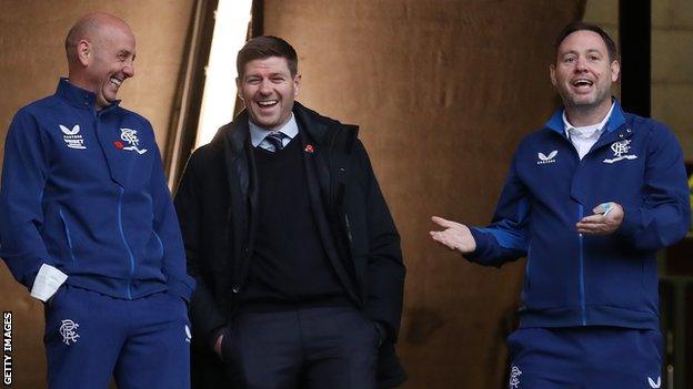 Michael Beale (right), alongside Gary McAllister and Steven Gerrard