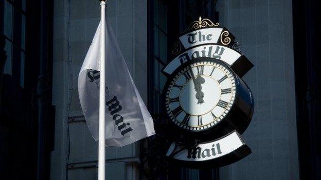 The Daily Mail flag and clock