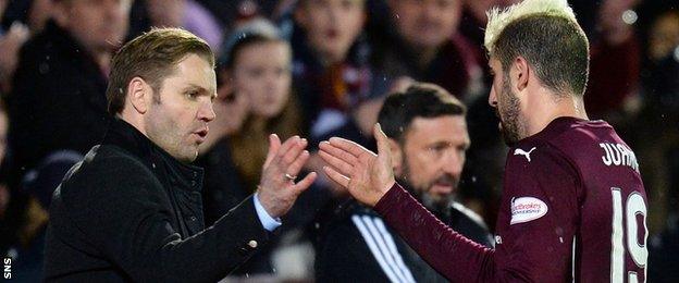 Hearts boss Robbie Neilson congratulates striker Juanma