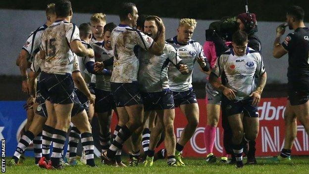 Scotland celebrate scoring against New Zealand during their match at last year's Four Nations