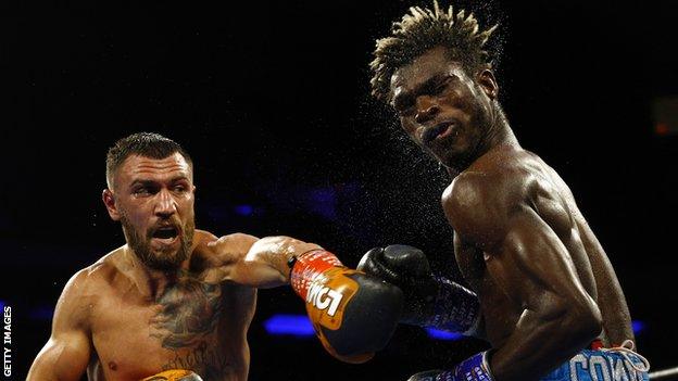 Ukraine's Vasiliy Lomachenko connects with a punch against Ghana's Richard Commey at Madison Square garden in New York