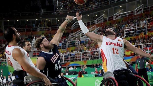 Aaron Gouge of the USA and Asier Garcia of Spain compete for the ball