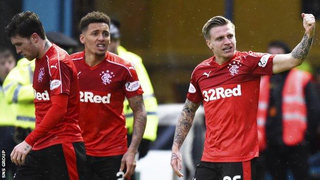 Jason Cummings celebrates his first goal for Rangers