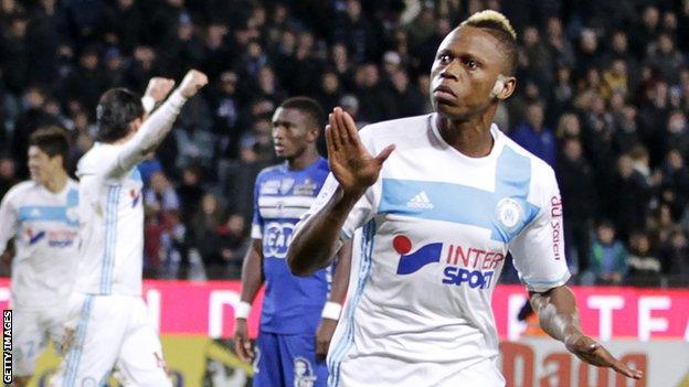 Clinton Njie celebrates scoring for Marseille