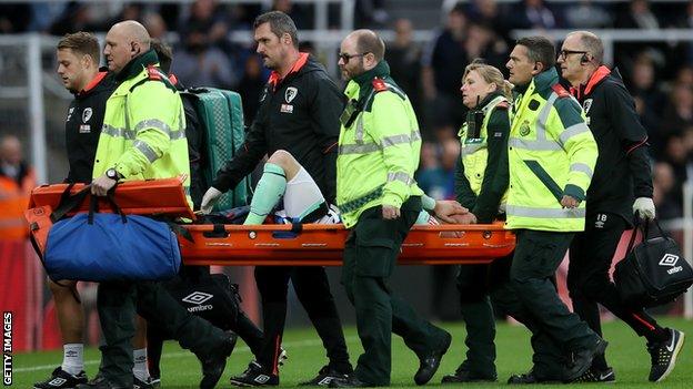 Adam Smith is stretchered off