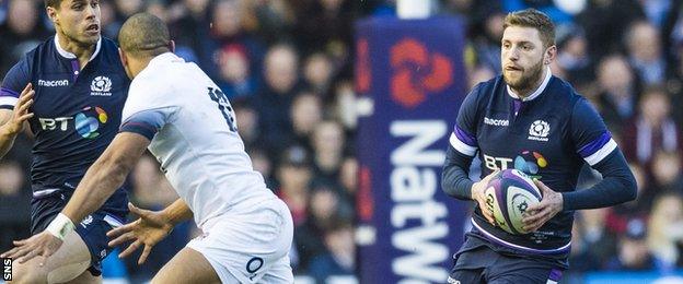 Scotland's Finn Russell (right) in action against England