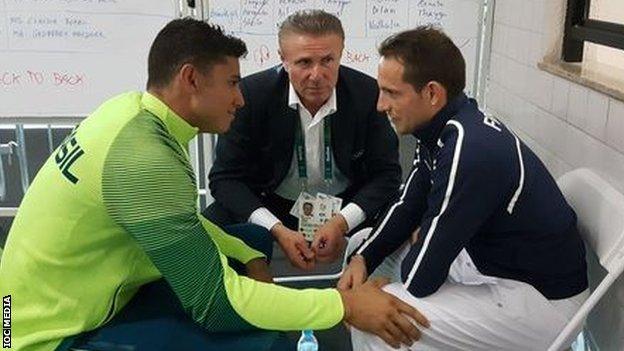 "Pole-vaulter Renaud Lavillenie consoled by Thiago Braz and Sergei Bubka after he was booed at medal ceremony", tweeted the IOC Media account