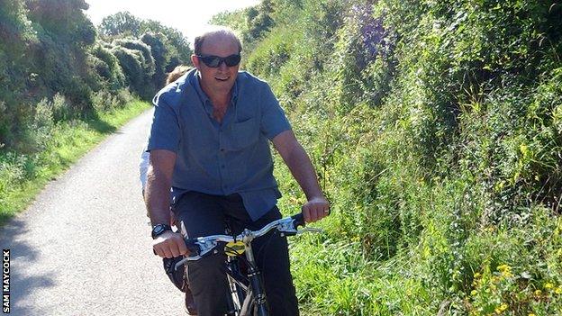 Nigel Maycock on a tandem with his wife