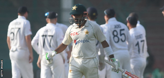 Babar Azam walks off after being dismissed