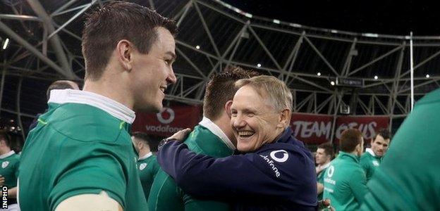 Johnny Sexton and Joe Schmidt celebrate beating New Zealand in 2018