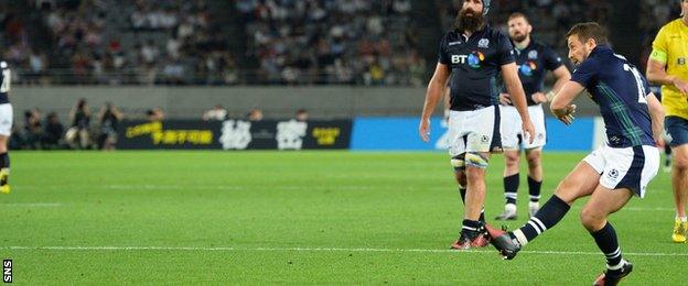 Scotland's Greig Laidlaw kicks a penalty against Japan