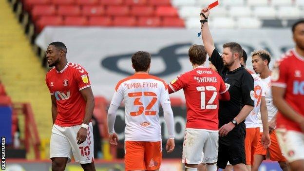 Chuks Aneke's 85th-minute dismissal in Saturday's 3-0 home defeat by Blackpool at The Valley was one of two red cards handed out to Charlton players