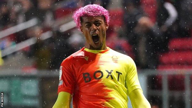 Lyle Taylor celebrates scoring twice against Bristol City for Nottingham Forest