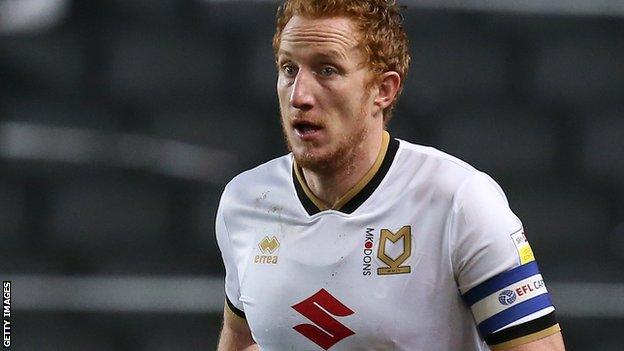 Dean Lewington in action for MK Dons