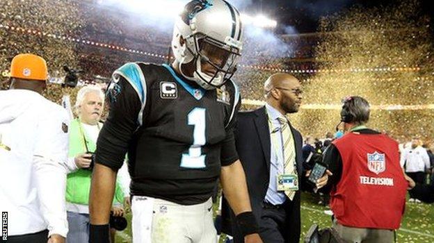 Cam Newton walks off dejected