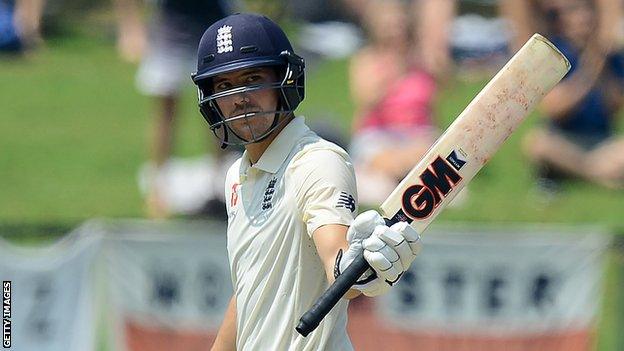 England opener Rory Burns raises his bat to salute the crowd after reaching his fifty during the second Test against Sri Lanka