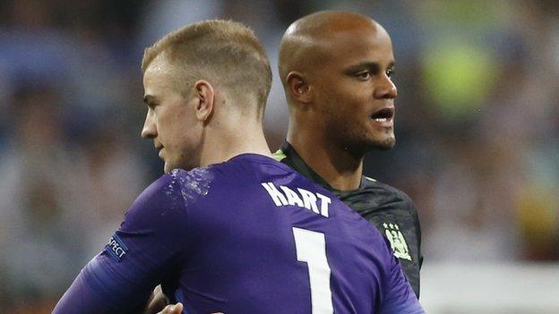 Joe Hart hugs Vincent Kompany