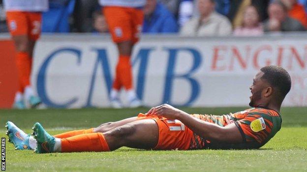 Jeremie Bela celebrates after scoring his first goal since September 2021