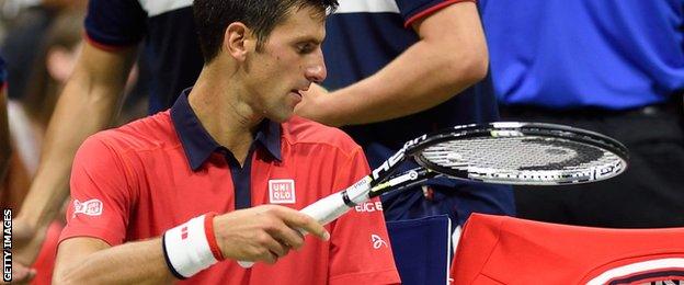 Novak Djokovic and a broken racquet