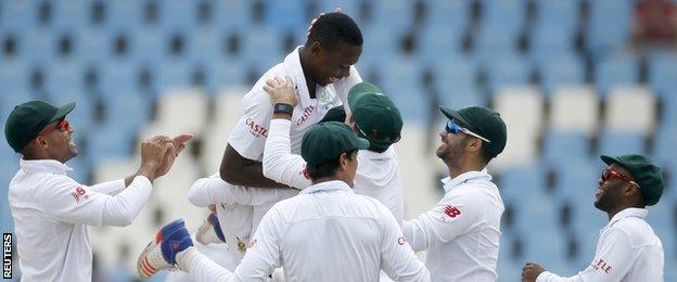 Kagiso Rabada (top) celebrates with team-mates