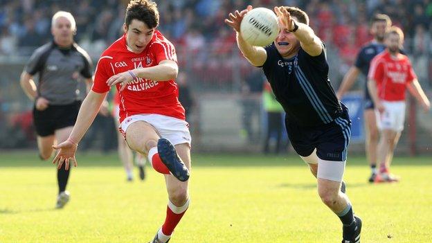 Trillick's Lee Brennan has his shot blocked by Danny Gorman in the Tyrone final