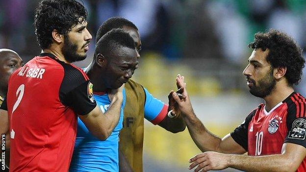 Egypt's players console Burkina Faso goalkeeper Herve Koffi