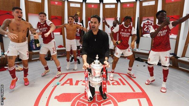 Arsenal celebrate with the FA Cup