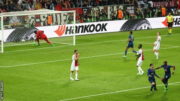 Paul Pogba (bottom right) celebrates scoring the opening goal