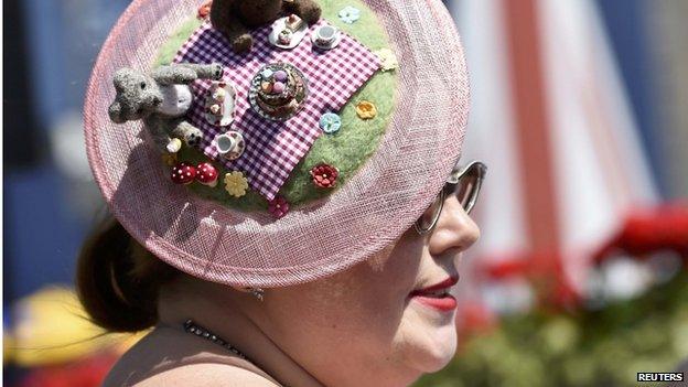 Jennifer Dardling shows off her hat on Ladies Day at Royal Ascot, just south of London, Britain, June 18