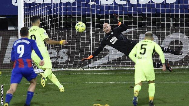 Luis Suarez scores from the spot for Atletico Madrid against Eibar