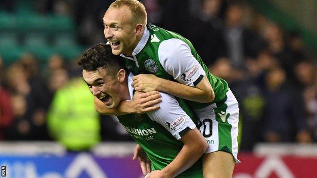 John McGinn and Dylan McGeouch celebrate Hibs' victory over Hearts