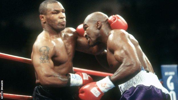 Mike Tyson (left) against Evander Holyfield