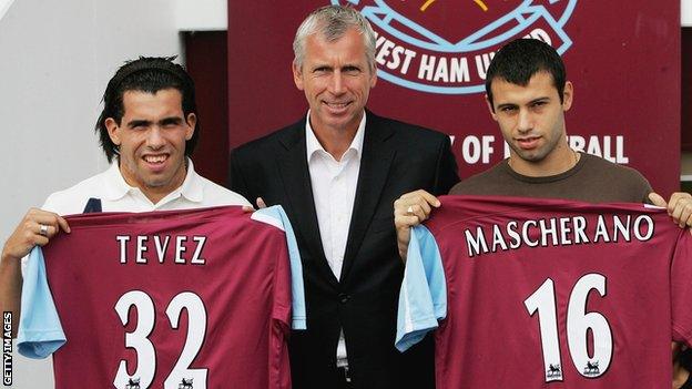 Carlos Tevez (left) and Javier Mascherano (right) at their West Ham unveiling with Alan Pardew (centre)