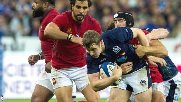 Scotland's Mark Bennett is tackled by Alexandre Dumoulin