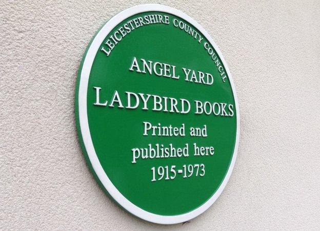 Green plaque