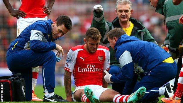 Jack Wilshere receves treatment