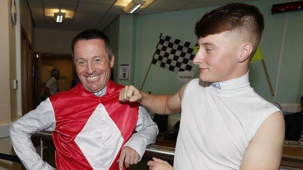 Six-time champion jockey Kieren Fallon with his son Cieren