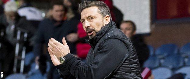 Aberdeen manager Derek McInnes celebrates