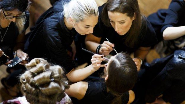 Models backstage ahead of the DAKS show during London Fashion Week Spring/Summer 2016