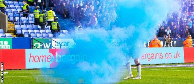 Flare thrown from the stands at Bolton