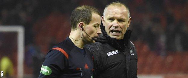 Willie Collum exchanges words with Inverness Caledonian Thistle manager John Hughes