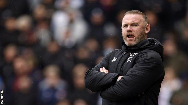 Wayne Rooney on the sideline as Derby manager