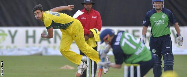 Australian paceman Mitchell Starc tests the batting technique of Niall O'Brien at Stormont