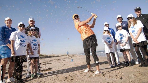 Carly Booth helps out with the Scottish Golf launch