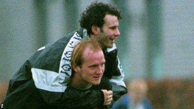 John Hartson gives Ryan Giggs a piggyback during Wales training in March, 1997