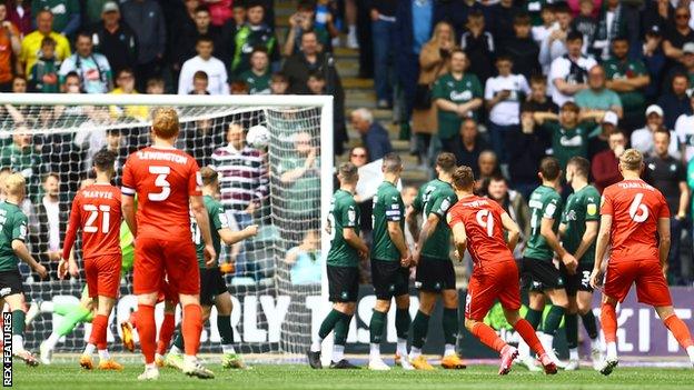 Scott Twine scores a free kick