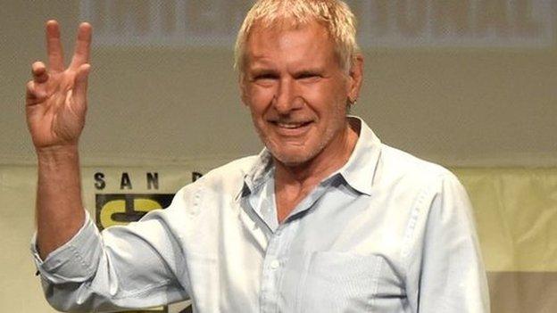 Actor Harrison Ford walks onstage at the Lucasfilm panel during Comic-Con International 2015