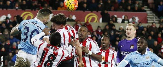 Nicolas Otamendi heads the ball