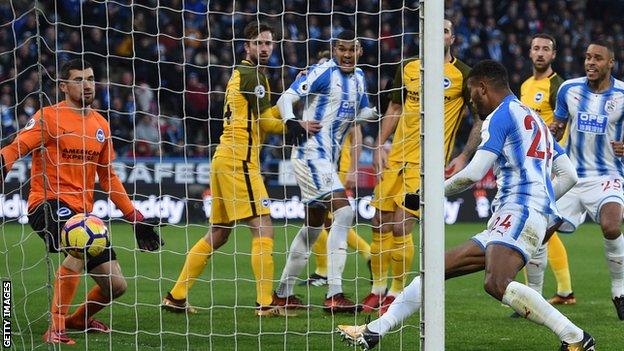 Steve Mounie bundles in for Huddersfield