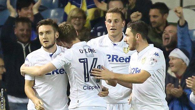 Chris Wood (centre) celebrates with team-mates